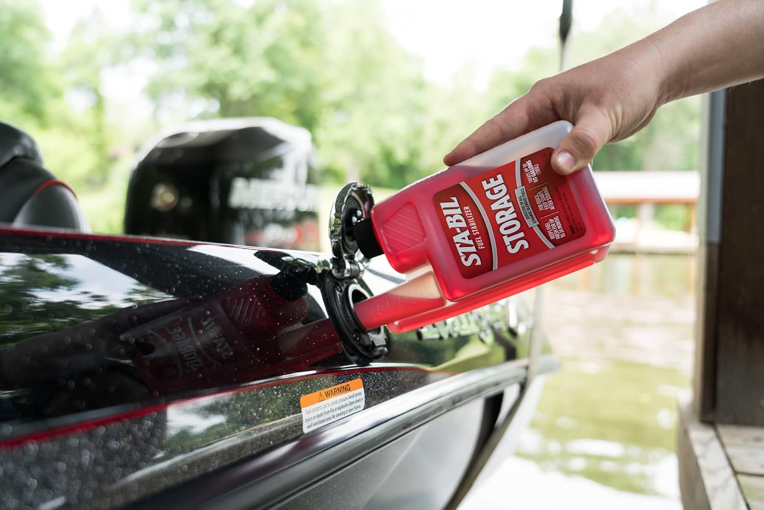 32 oz bottle of fuel stabilizer with measuring cap